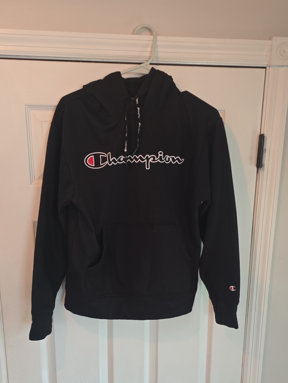 Champion Black Hoodie with White Script and Red Accent